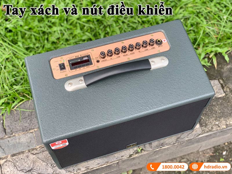 mat tren loa co tay xach va nut dieu chinh